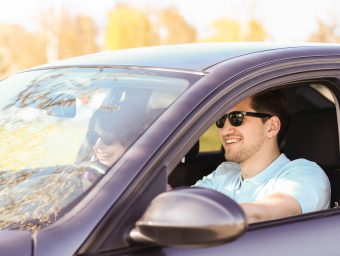 Travel. Couple is traveling in the car